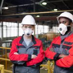 Workers in respiratory masks